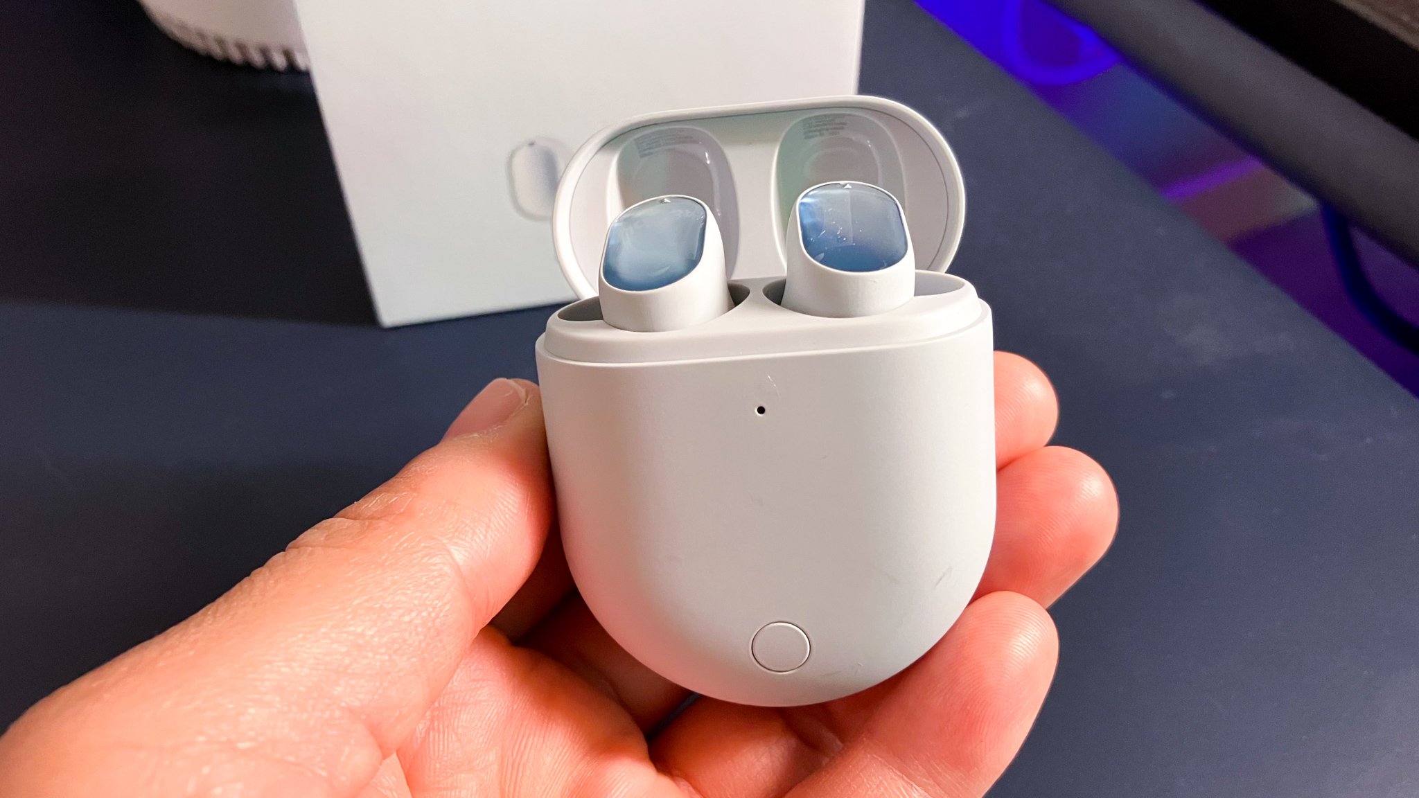 Redmi Earbuds in Hands Open.jpg